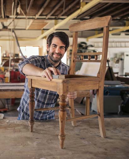 Carpenter making a chair